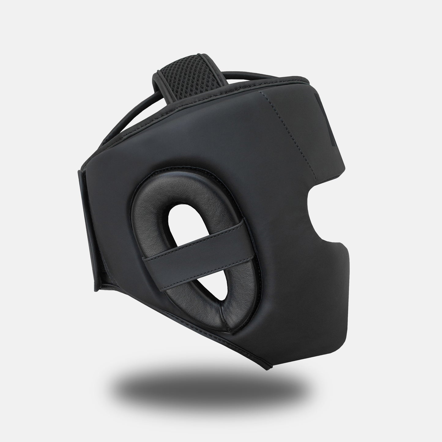 GSX Black on Black head guard shown from the side.
