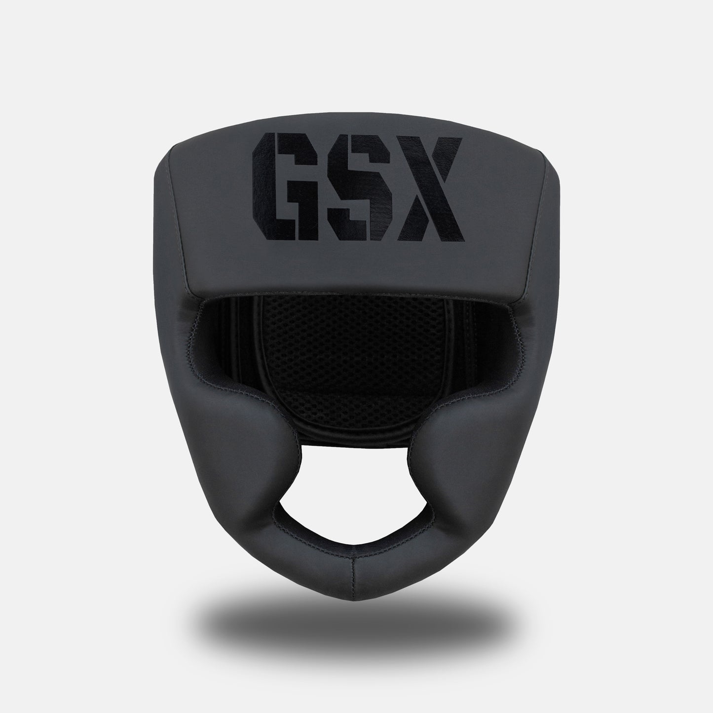 Front view of the GSX Black on Black head guard showing its protective padding and open-face design.
