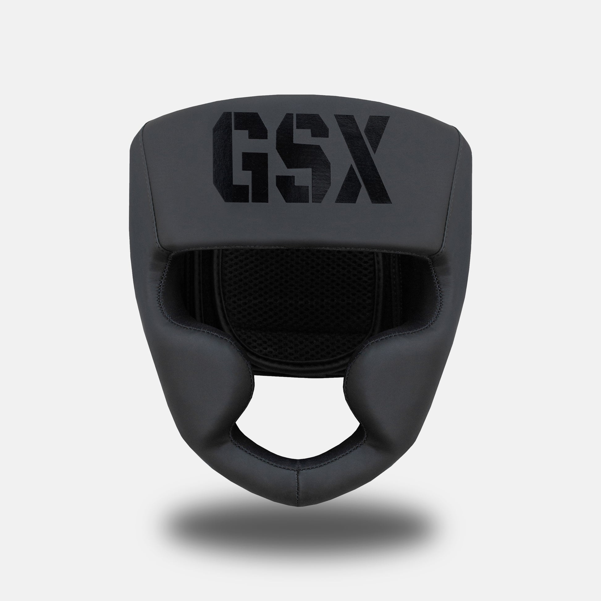 Front view of the GSX Black on Black head guard showing its protective padding and open-face design.

