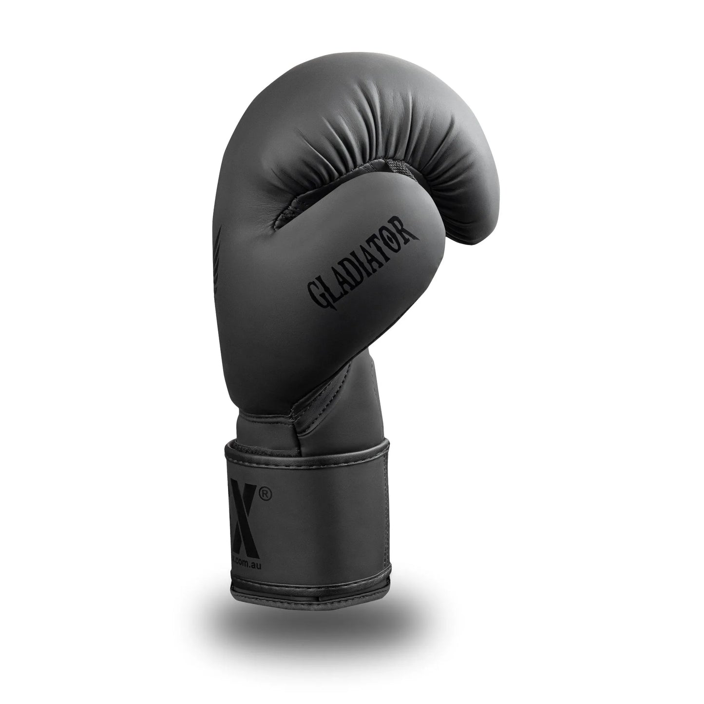 Side profile of GSX Black on black boxing glove featuring smooth contour padding and a reinforced wrist strap
