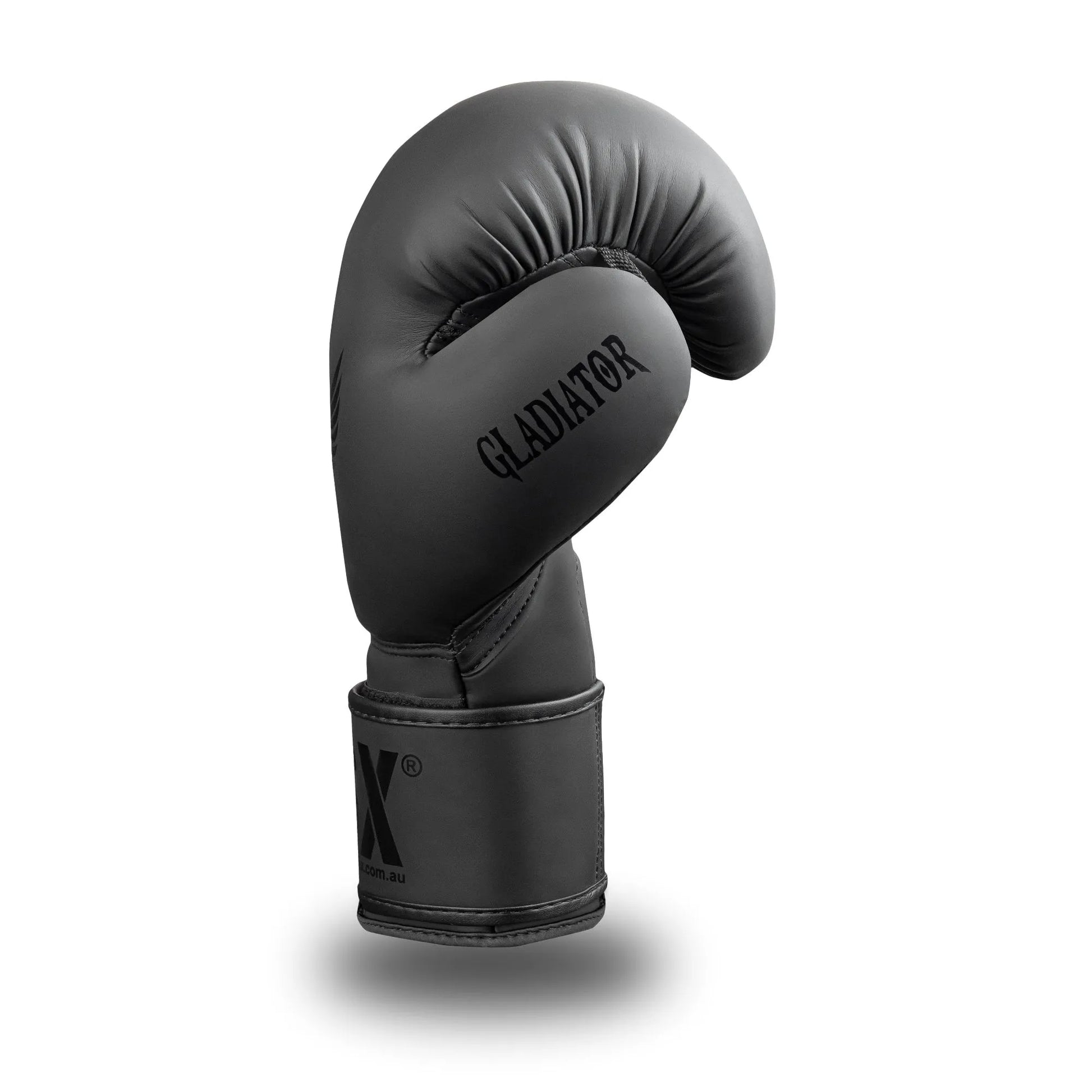 Side profile of GSX Black on black boxing glove featuring smooth contour padding and a reinforced wrist strap
