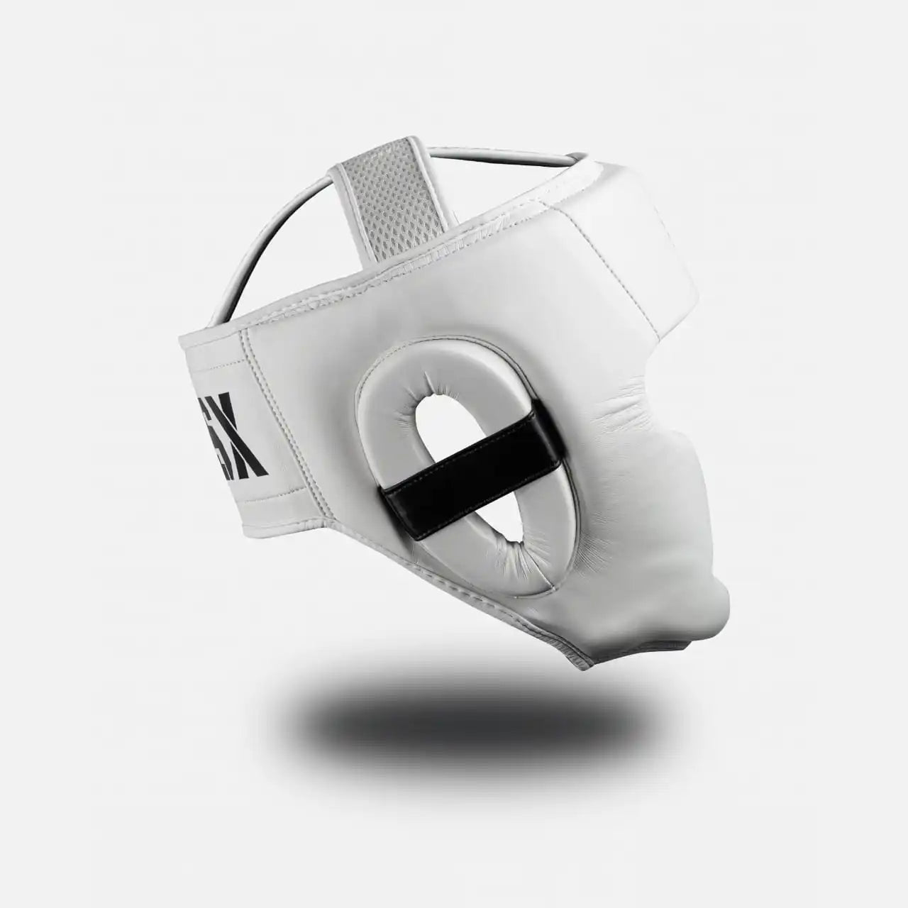Side view of Black on white GSX boxing head guard showing ear padding and secure strap support
