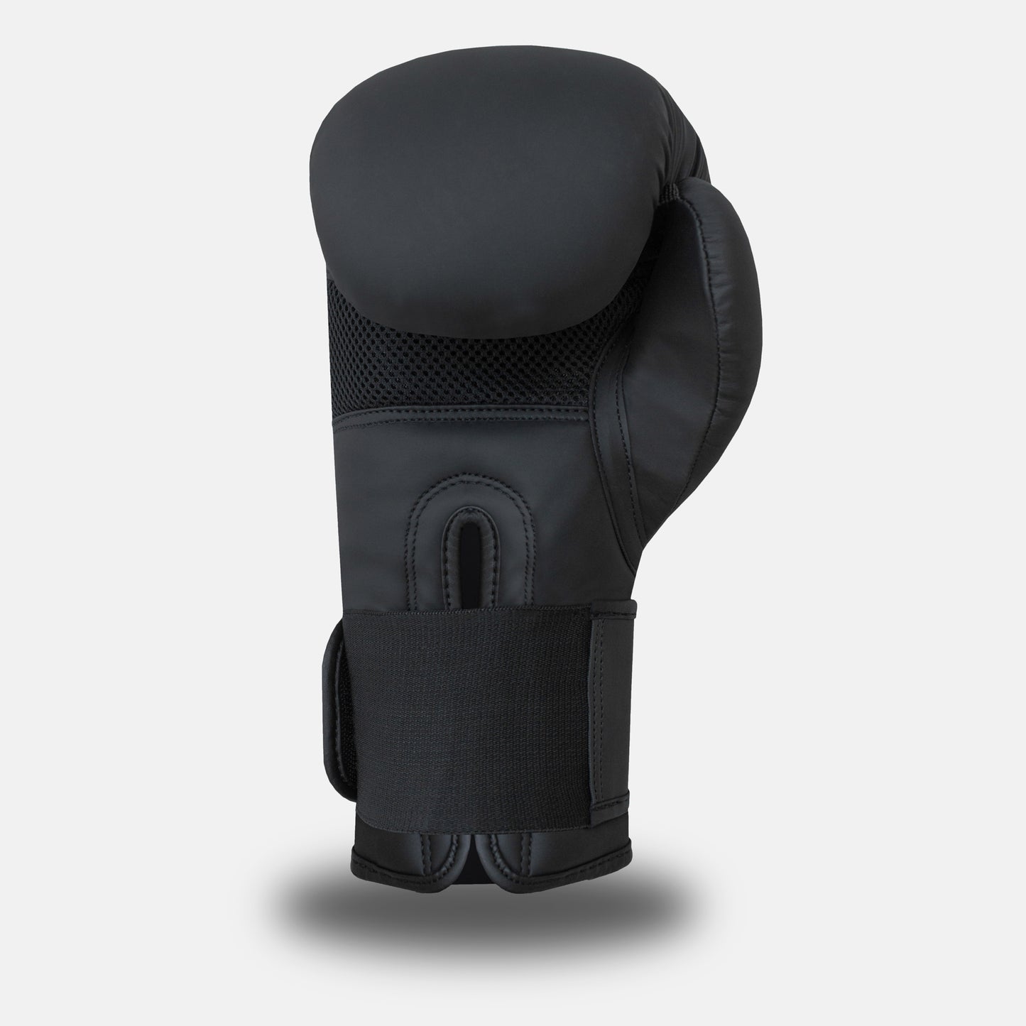 
Back-side view of GSX Black on black boxing glove with padded wrist strap and breathable mesh panel
